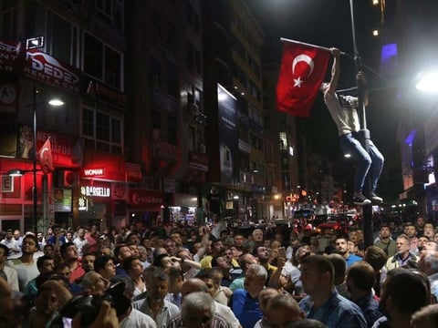 People react to the attempted military coup in Rize on Friday.